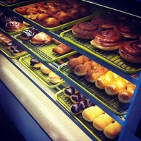 Photo taken at Rainbow Donuts by Michael C. on 5/12/2012