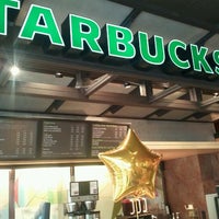 Photo taken at Starbucks by Sam Y. on 4/21/2012