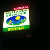 Photo taken at Wetlands Brew Pub &amp;amp; Sports Bar by Rufus C. on 2/12/2012