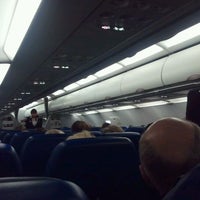 Photo taken at рейс 818 омск - москва by Ilya K. on 3/10/2012