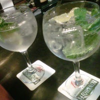 Photo taken at La Ruleta Gin Tonic Bar Madrid by Luis G. on 5/14/2012