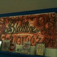 Photo taken at Bloodline Tattoos by NeffStarr L. on 12/3/2011