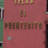 Photo taken at Telas El Puentecito by Fer L. on 8/21/2012