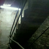 Photo taken at Scariest Parking Garage Ever! by Kerry L. on 5/14/2011
