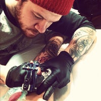 Photo taken at Unbreakable Tattoo by Nora M. on 3/6/2012