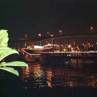 Photo taken at Shuttle Boat Pier by Suriya S. on 3/27/2012