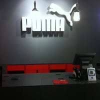 Photo taken at The PUMA Store by E T. on 1/25/2012