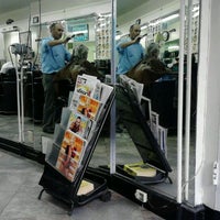Photo taken at Royal Unisex Hair Style by Edwin R. on 11/6/2011