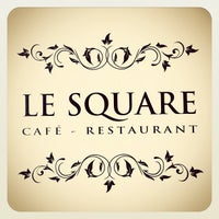 Photo taken at Le Square Café by Caroline D. on 3/16/2012