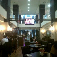 Photo taken at Scala Restaurant &amp;amp; Cafe by Serdar K. on 11/30/2011