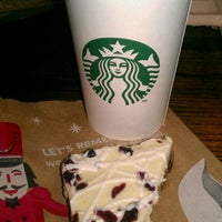Photo taken at Starbucks by Carlos V. on 1/1/2012