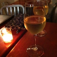 Photo taken at Pure Wine Cafe by Kathleen F. on 3/8/2012