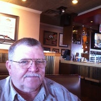 Photo taken at Applebee&amp;#39;s Grill + Bar by Jacolyn G. on 12/7/2011