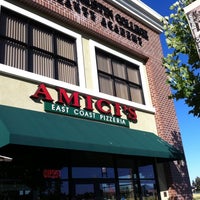 Photo taken at Amici&amp;#39;s East Coast Pizzeria by Victor W. on 7/3/2012