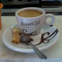 Photo taken at Sweet Gift Café by Thiago G. on 11/12/2011