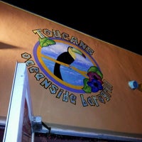 Photo taken at Toucans Oceanside Bar &amp;amp; Grill by Jenn G. on 12/17/2011