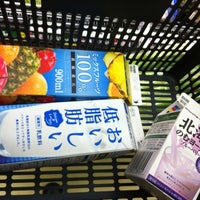 Photo taken at Lawson Store 100 by Munetoshi T. on 7/11/2012