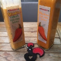 Photo taken at Nando&amp;#39;s by Stacey on 7/28/2012