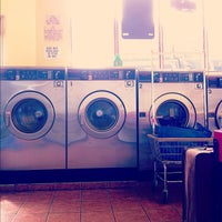 Photo taken at Care Wash &amp;amp; Dry Coin Laundry by Ashley G. on 2/28/2012