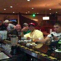 Photo taken at Sporting News Bar &amp;amp; Grill by Liz F. on 1/4/2012
