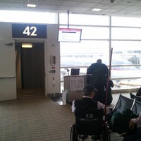 Photo taken at Gate D42 by Craig T. on 4/13/2011