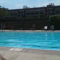 Photo taken at Medical District Apartments Pool and Sundeck by Paige B. on 8/2/2012