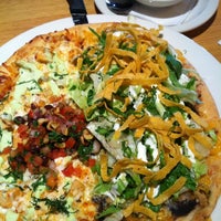 Photo taken at California Pizza Kitchen by Brad B. on 10/5/2011