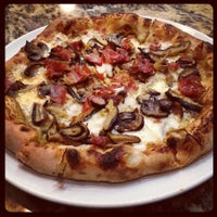 Photo taken at Olio Wood Fired Pizzeria by Pat S. on 3/2/2012