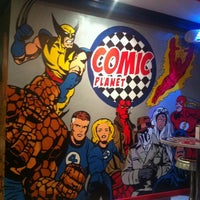 Photo taken at Comic Planet by Andres G. on 9/6/2012