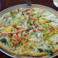 Photo taken at Milano&amp;#39;s Pizzeria &amp;amp; Italian Grill by Emily H. on 7/17/2011