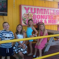 Photo taken at Yummies Donuts &amp; BBQ by Gregory H. on 4/23/2011