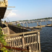 Photo taken at The Deck at Harbor Pointe by Mike J. on 7/31/2011