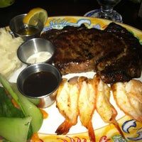 Photo taken at Buzz&amp;#39;s Wharf Resturant by Erin B. on 8/15/2011