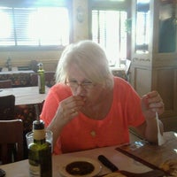 Photo taken at Zio&amp;#39;s Italian Kitchen by Andrew R. on 7/3/2012
