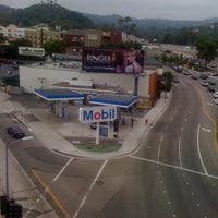 Photo taken at Mobil by Alfredo C. on 8/11/2011