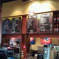 Photo taken at Black Cat Coffee House by Joy G. on 1/7/2012