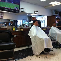 Photo taken at Manny&amp;#39;s Barber Shop by Octavio R. on 7/21/2011