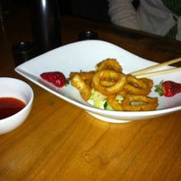Photo taken at Mizu Japanese Steakhouse by Andrew S. on 12/3/2011