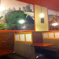Photo taken at Aji Peruvian Restaurant by Ellen B. on 1/23/2012