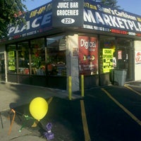 Photo taken at Sam&#39;s Caribbean Market by Rich W. on 5/19/2012
