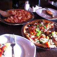 Photo taken at Juliu&amp;#39;s pizzas by Borree L. on 2/12/2012