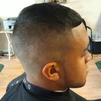 Photo taken at Images Of Us Barber Salon by Dre B T. on 7/23/2012