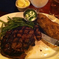 Photo taken at Wrangler Steakhouse by Alain M. on 7/19/2012
