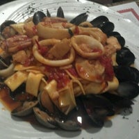 Photo taken at Porto Bello Pizza and Restaurant by Dana on 8/1/2012