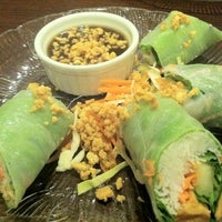 Photo taken at Khao Thai Restaurant by Ginny T. on 3/9/2012