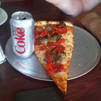 Photo taken at Russo&#39;s New York Pizzeria by Rae H. on 4/26/2011