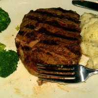 Photo taken at Outback Steakhouse by Tracie G. on 10/28/2011