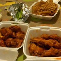 Photo taken at Cravin&amp;#39; Chicago Wings by Melanie V. on 4/4/2011