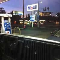 Photo taken at Mobil by Michael F. on 10/9/2011