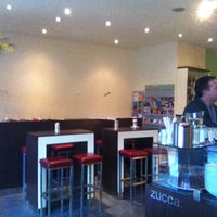 Photo taken at Zucca Coffeebar by Haruka K. on 3/1/2012